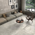 Gray concrete-effect forged titanium porcelain tile with subtle texture and matte finish for durable flooring
