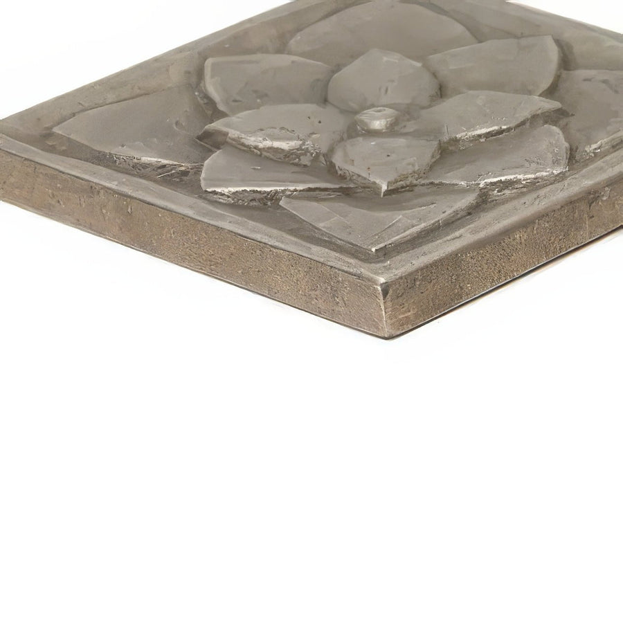 Silver-toned metallic wall plaque with raised textured lotus flower design foundry lotus inset decorative art