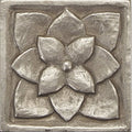Foundry lotus inset silver-toned raised floral tile with textured metallic finish and layered petal design