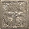 Silver four-leaf clover tile with raised textured petals and central dots from foundry moonblossom inset collection