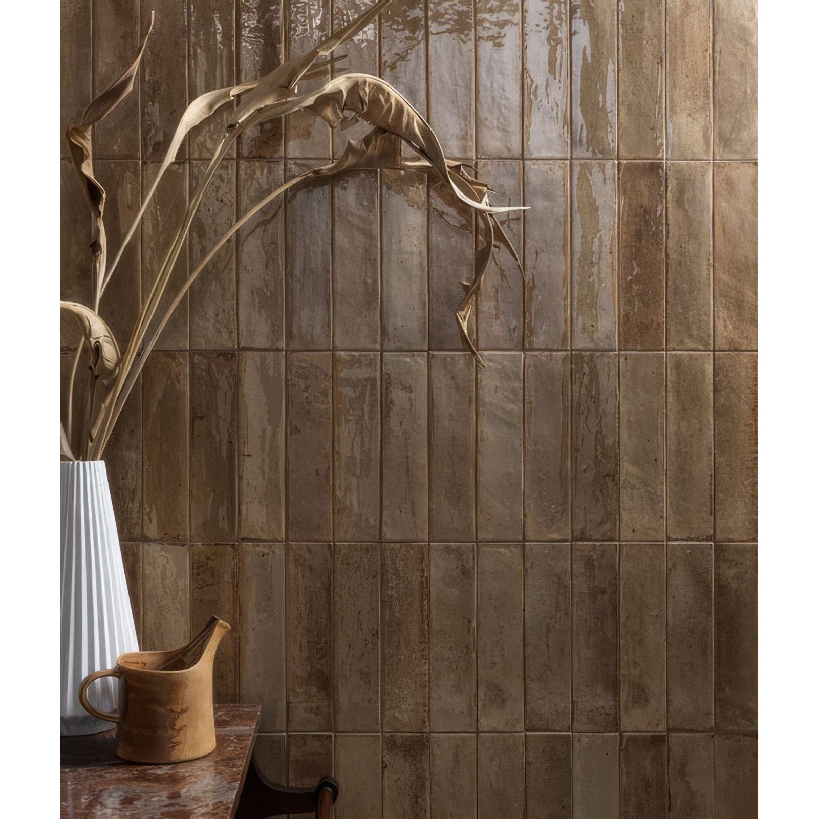 Earthy-toned textured porcelain tiles with a rustic weathered finish in beige foundry novo porcelain beige design