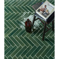 Foundry novo porcelain irish green dark green herringbone patterned ceramic floor tiles with white grout