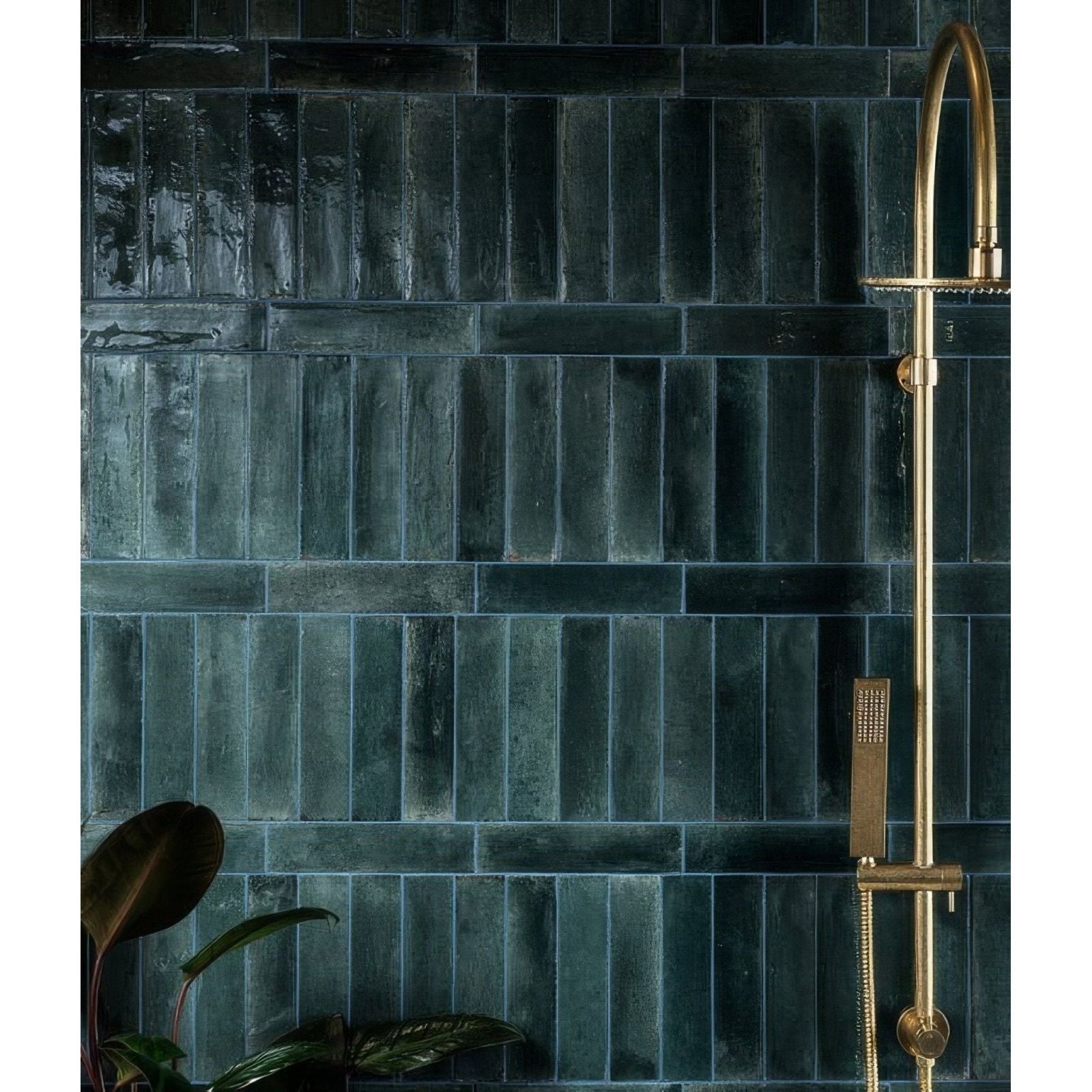 Dark teal rectangular ceramic tiles with glossy textured finish forming a wall in foundry novo porcelain navy design