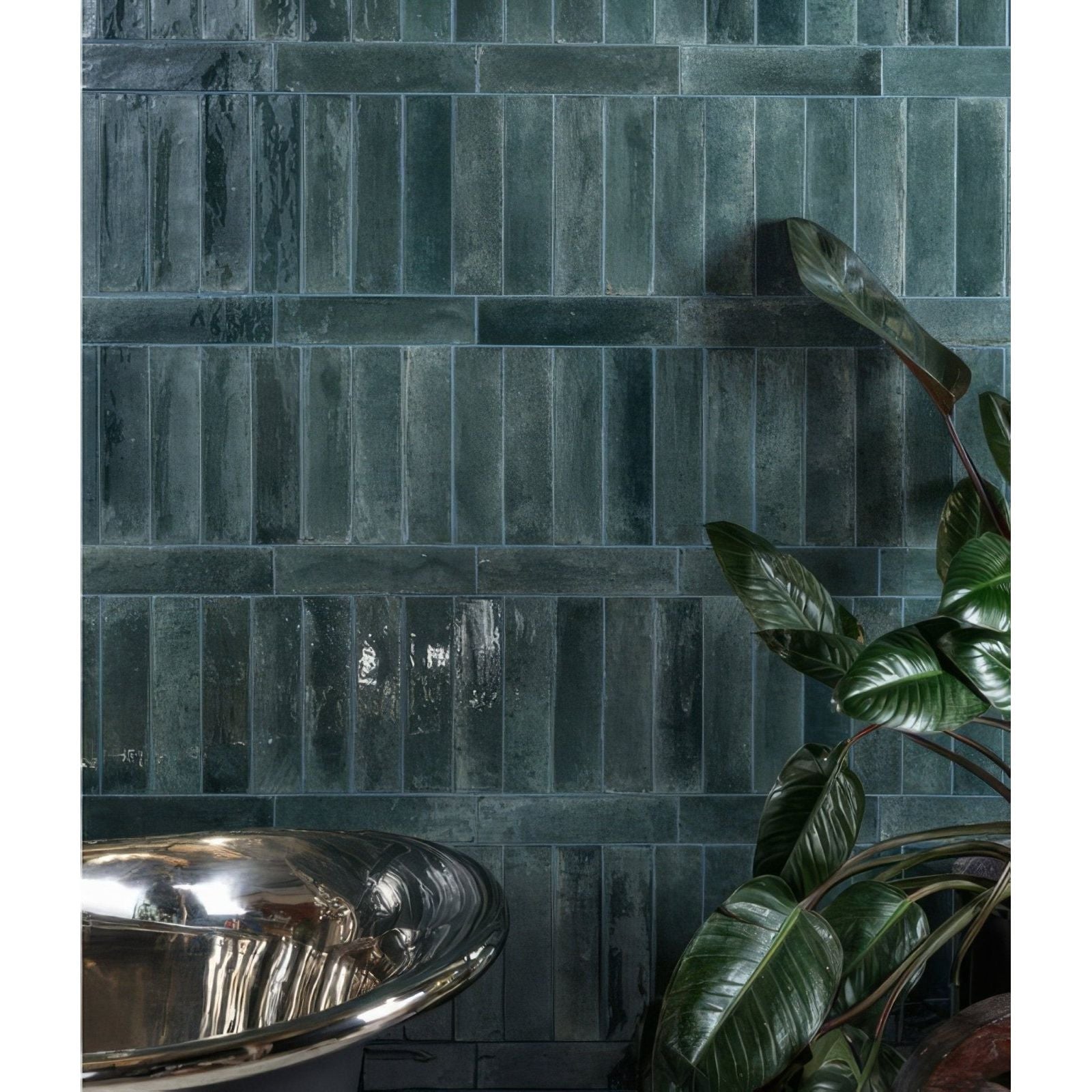 Dark teal glossy textured rectangular porcelain tiles on wall in foundry novo porcelain navy collection
