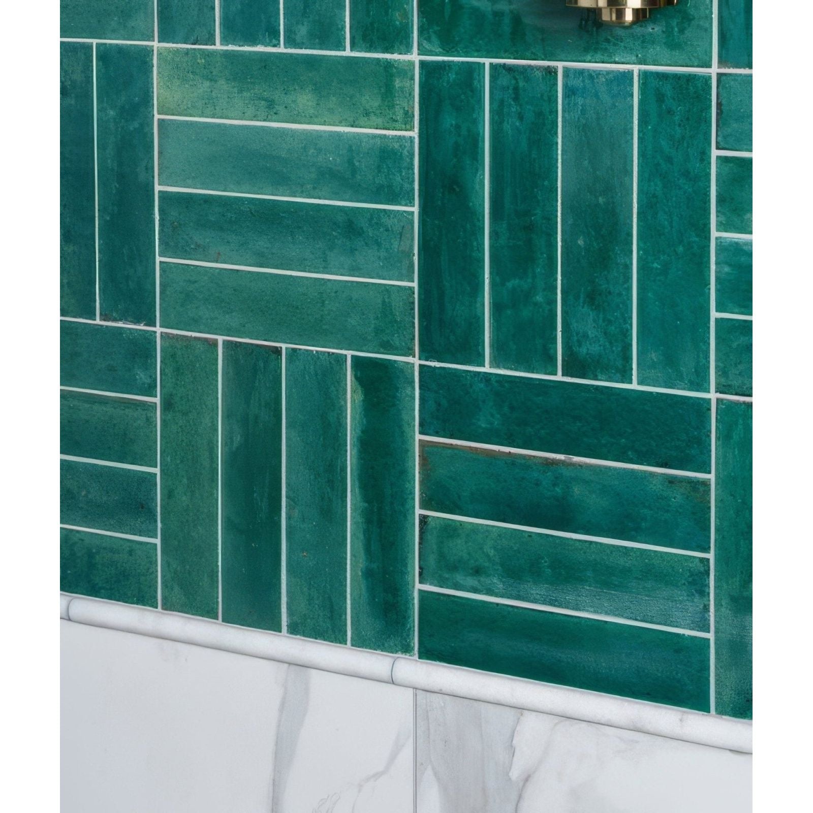 Foundry novo porcelain turquoise emerald green rectangular tiles with matte textured finish in herringbone pattern
