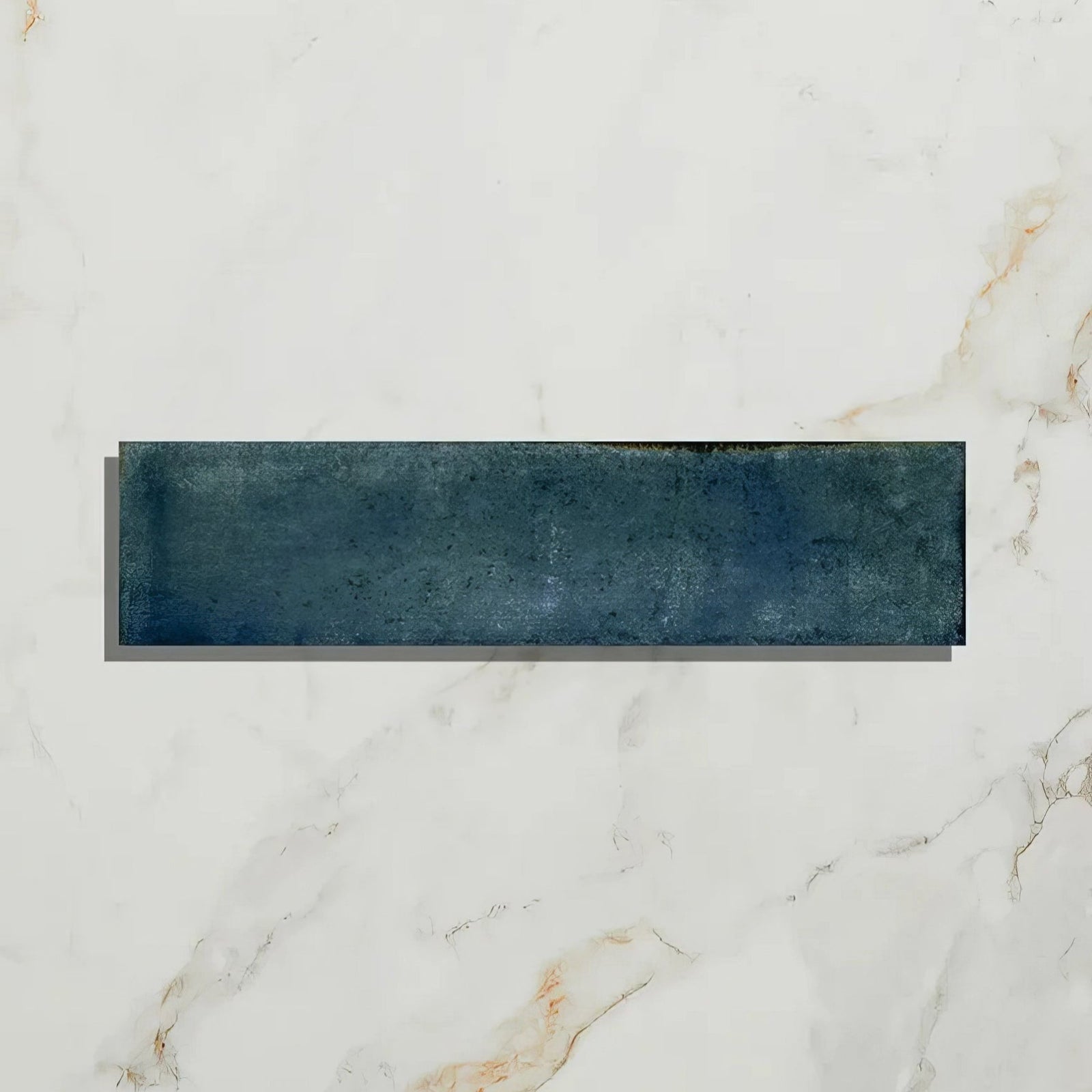 A rectangular navy blue ceramic tile with a textured matte finish from foundry porcelain blue collection