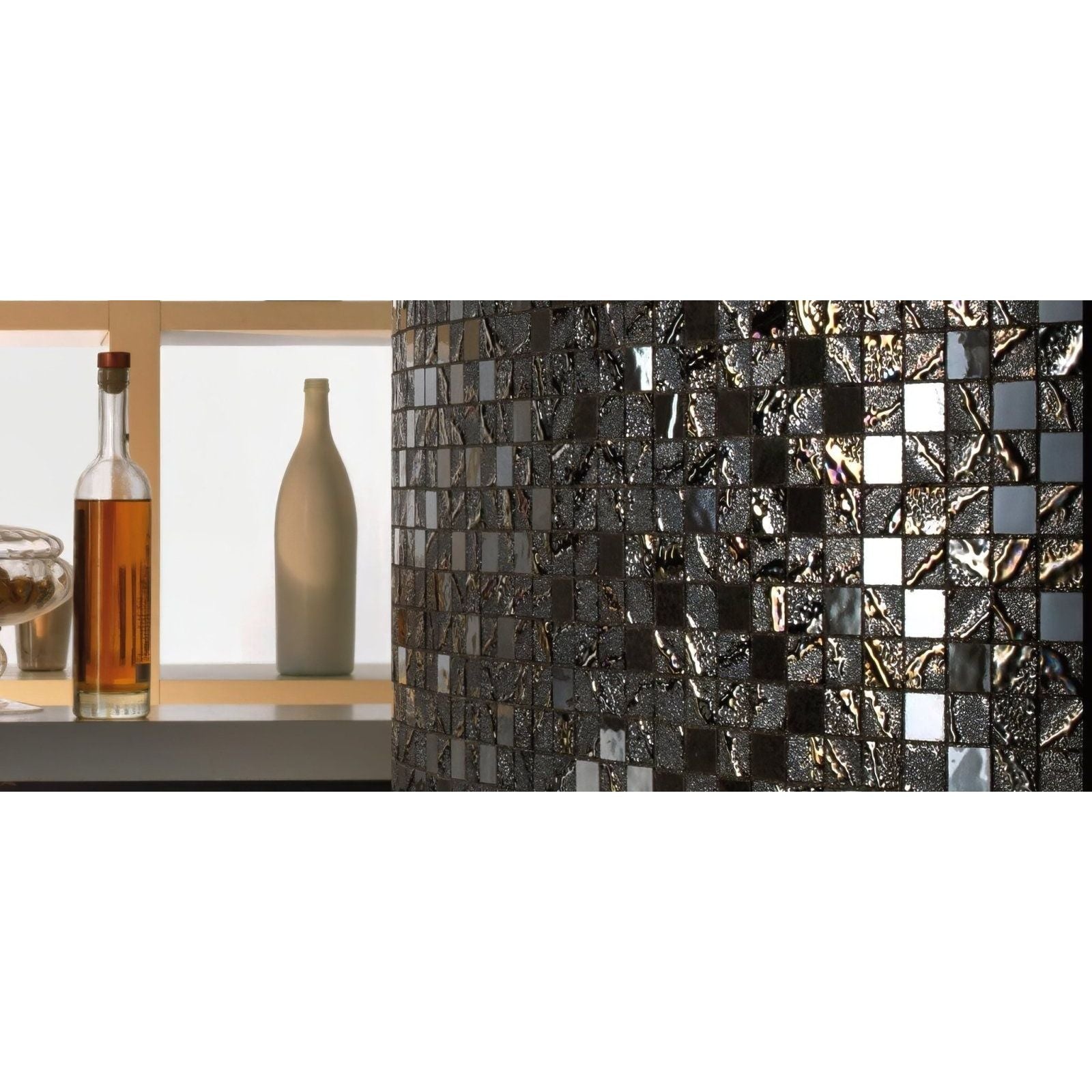 A cylindrical lampshade with a mosaic of textured iridescent black and silver glass tiles called four seasons winter mosaic
