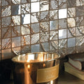 Four Seasons Wood Mosaic brown and silver metallic mosaic with a gold candle holder