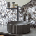Future Quartz Mosaic grey hexagon mosaic with a ribbed concrete vessel sink