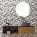 Future Quartz Mosaic grey hexagon mosaic with a round mirror above a ribbed sink