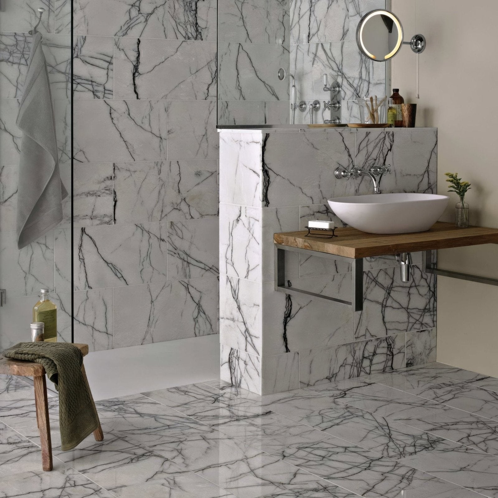Georgica Pond Diamond Sawn Edge Polished white marble tiles with a vessel sink