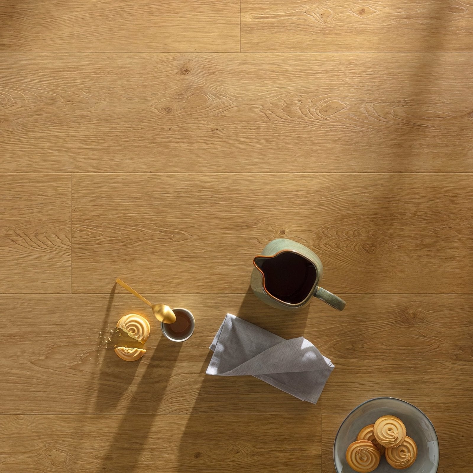 Light oak gingerbread FO26 long vinyl planks with warm natural wood grain pattern and subtle knots