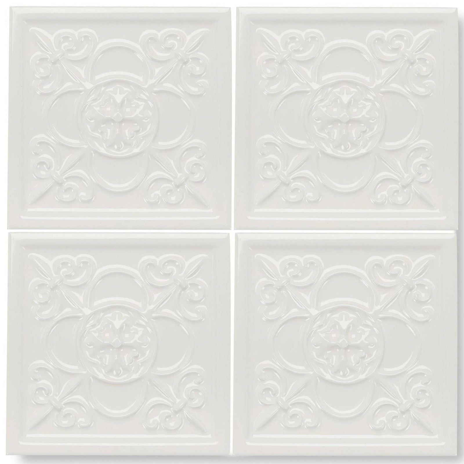 White ceramic giralda cascara cream decor tile with raised ornate floral and scrollwork patterns