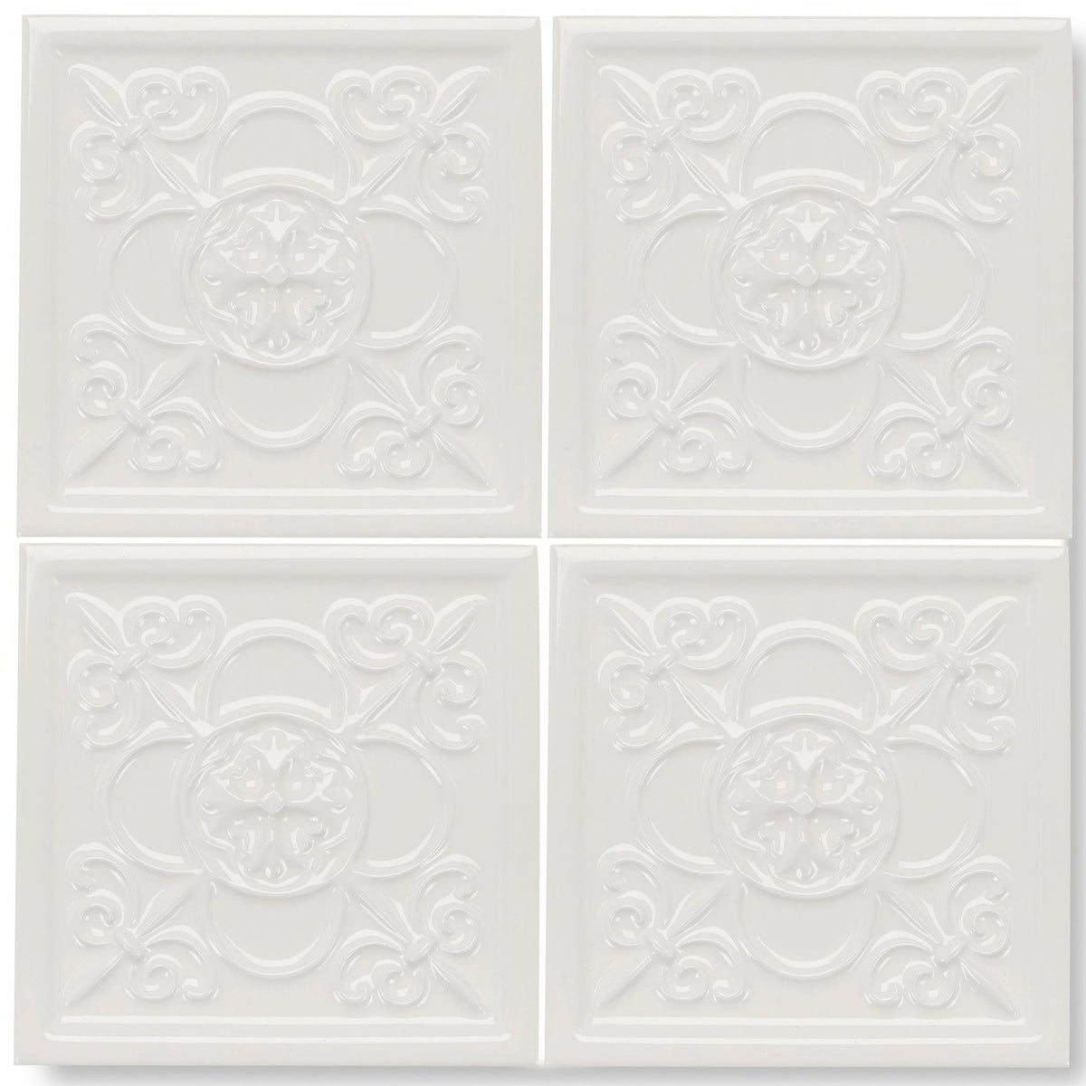 White ceramic giralda cascara cream decor tile with raised ornate floral and scrollwork patterns