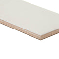 Giralda Cascara Cream tile is a cream-colored rectangular ceramic tile with a smooth glossy finish and beveled edges