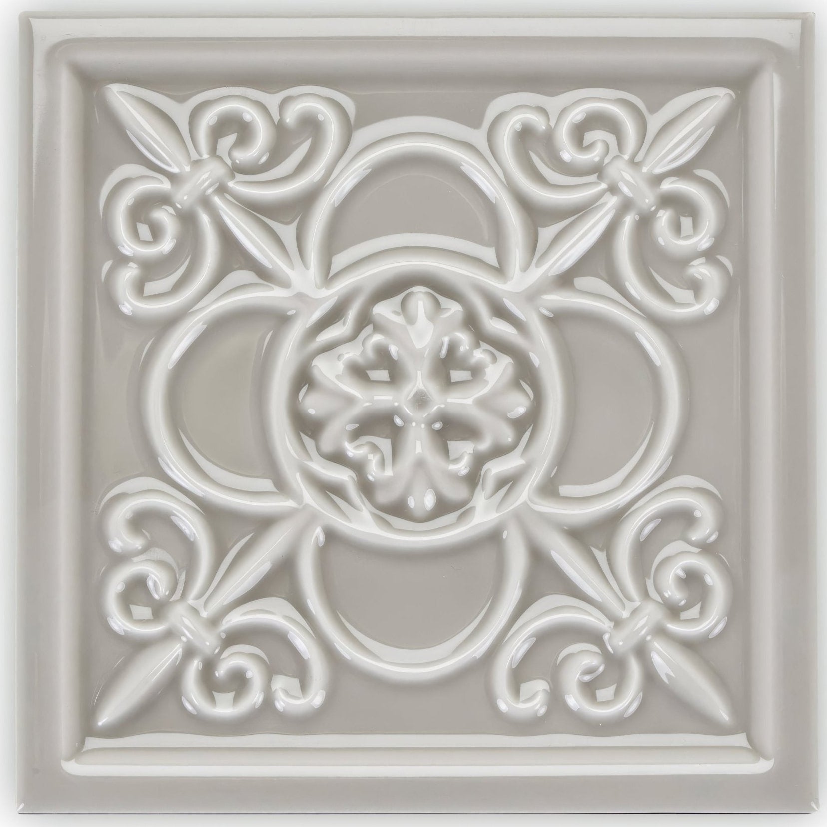 Giralda Niebla Grey off-white ceramic decor tile with ornate raised floral and scrollwork design