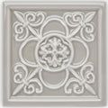Giralda Niebla Grey off-white ceramic decor tile with ornate raised floral and scrollwork design
