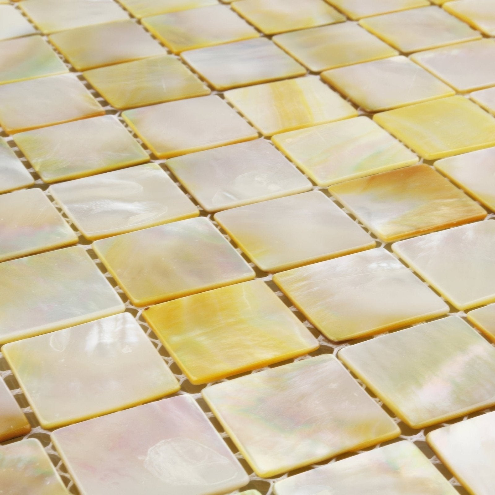 Golden promise 25mm square iridescent yellow and cream mother of pearl mosaic tiles with a glossy finish