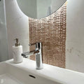 Gravity Aluminium Arrow Rose Gold Mosaic rose gold chevron aluminium mosaic with a chrome bathroom tap