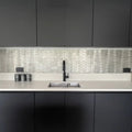 Gravity Aluminium Trace Metal Mosaic silver chevron aluminium mosaic with a black tap and stainless steel sink