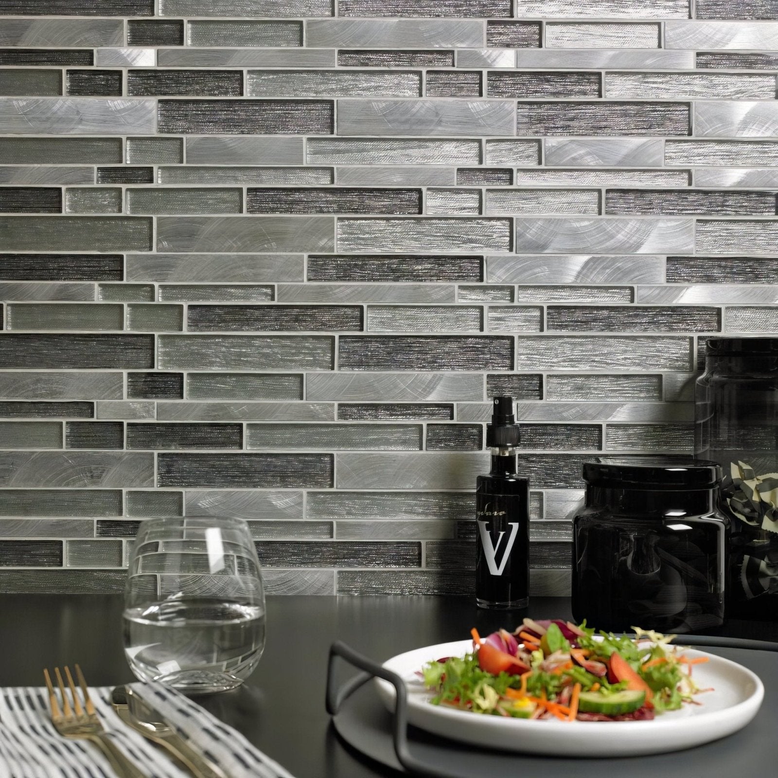 Grey glass and metal mix offset linear mosaic with silver metallic glass backsplash and brushed reflective finish