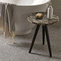 Grisaille 1.0 Venetian Stone Mosaic light green marble mosaic with a round marble-top side table on black legs