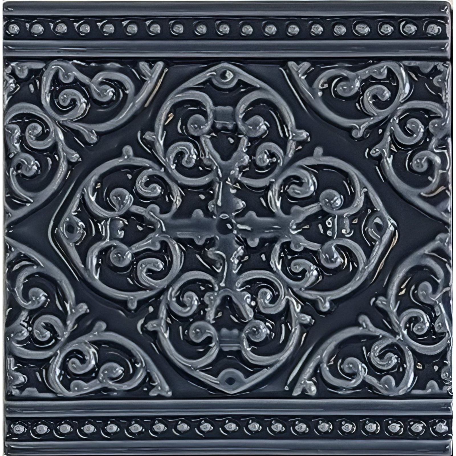 Dark gray ceramic tile grosvenor on ascot blue with intricate raised scrollwork design and beaded border