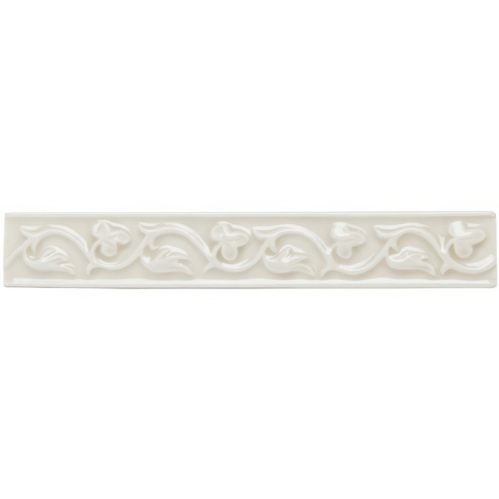 White ceramic tile hadleigh beaulieu with raised floral and vine pattern for decorative wall use