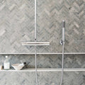 Hampton Bays 10 x 30cm Honed grey stone-effect tiles with a chrome shower system