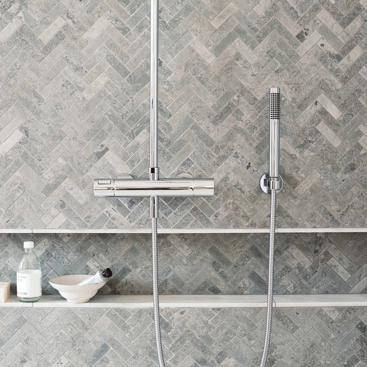 Hampton Bays 10 x 30cm Honed grey stone-effect tiles with a chrome shower system