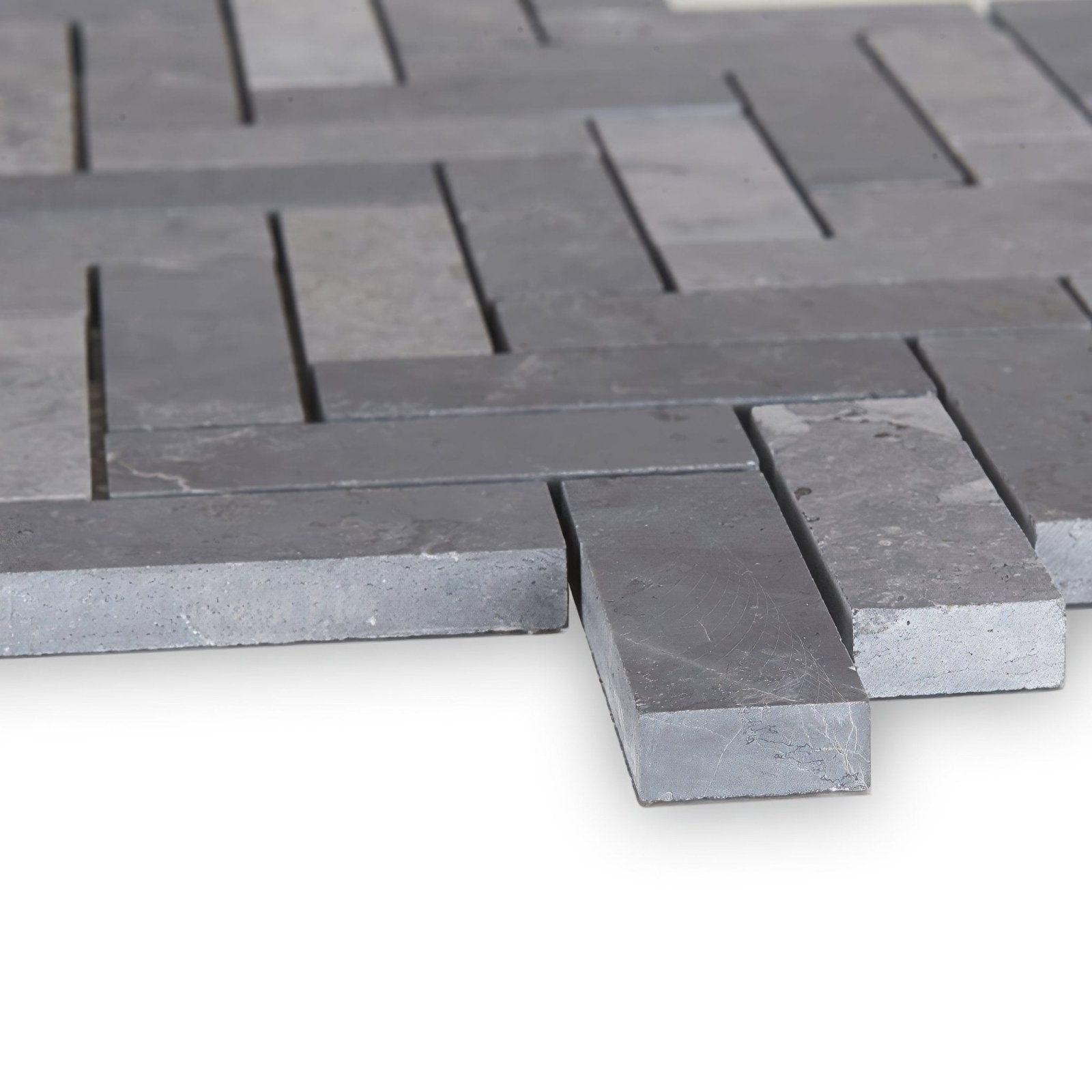Gray stone mosaic tiles in a herringbone pattern from hampton bays for stylish wall or floor decoration