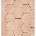 Handmade classic terracotta hexagonal floor tile in warm earthy tones with subtle natural color variations