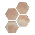Four handmade classic terracotta hexagonal tiles in warm earthy tones with subtle natural color variations