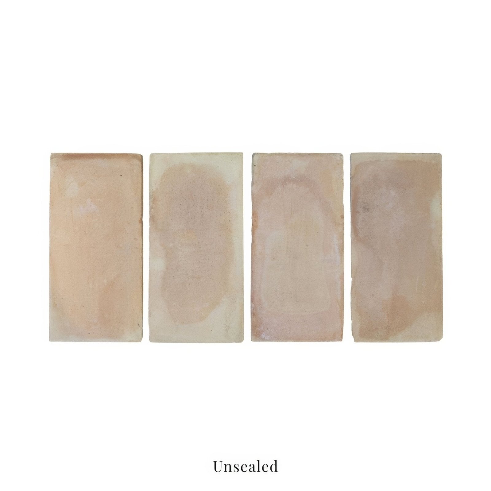 Four rectangular, unsealed terracotta tiles with a natural, earthy tone and subtle variations in color.