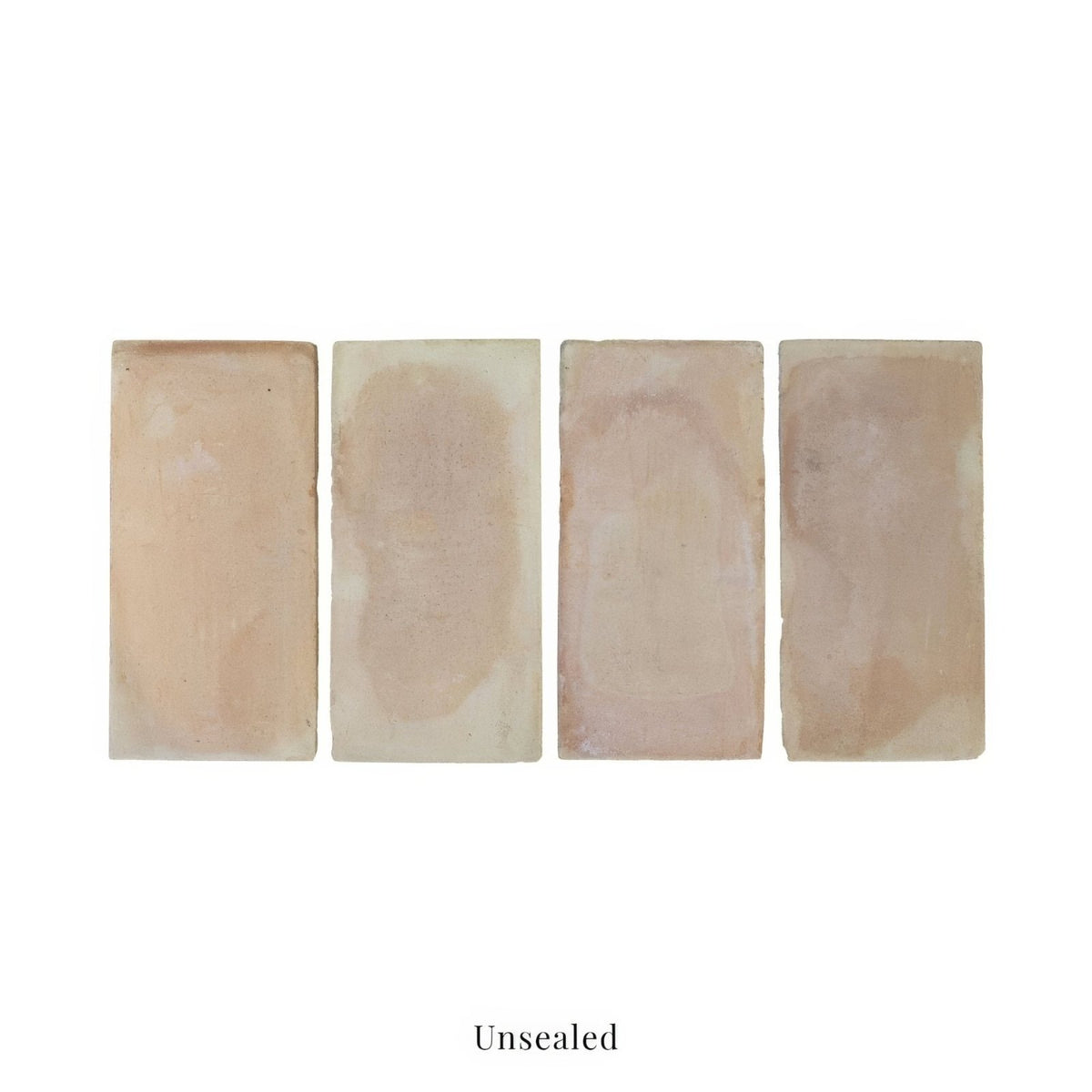 Four rectangular, unsealed terracotta tiles with a natural, earthy tone and subtle variations in color.
