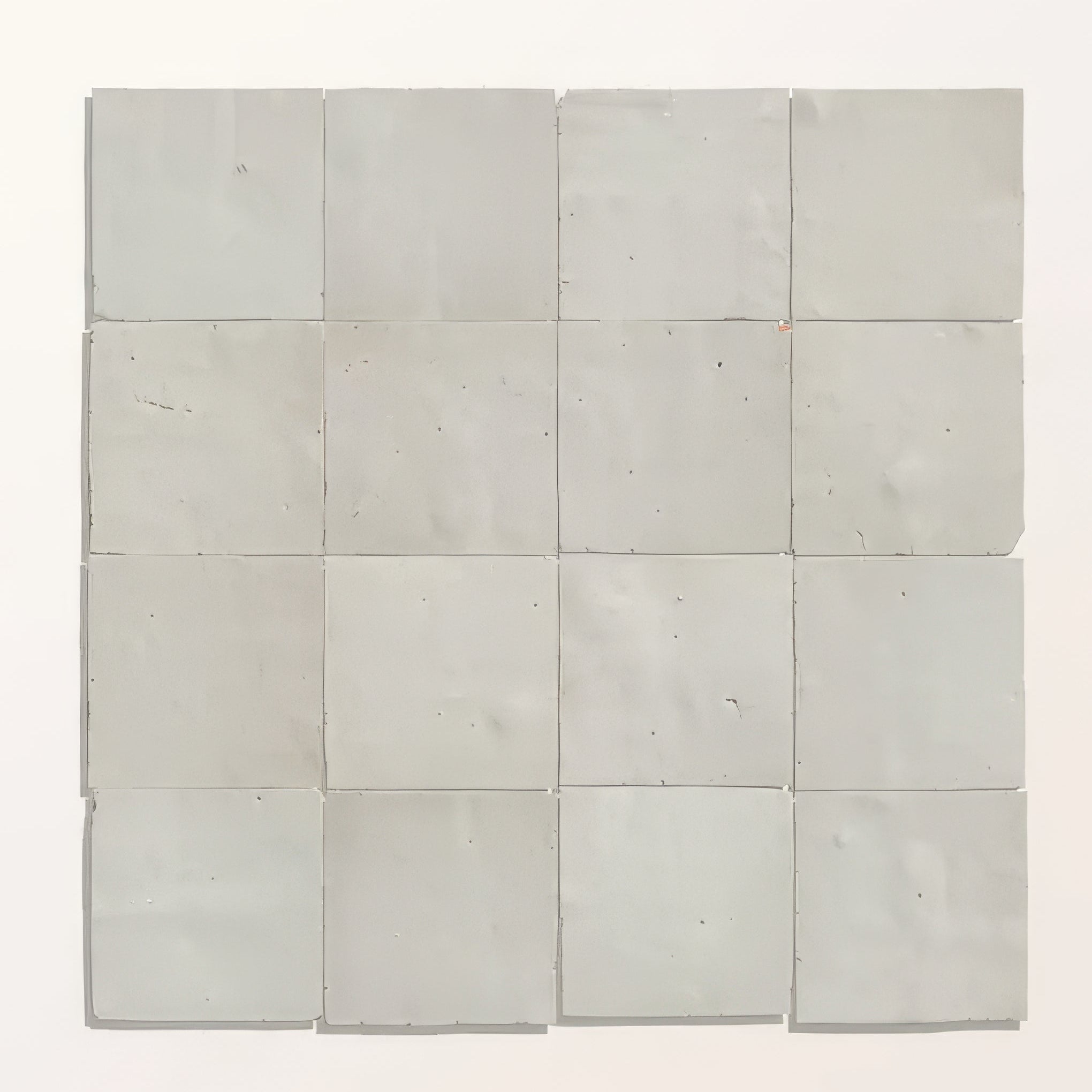 Grid of light gray tiles on a white background