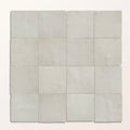 Grid of light gray tiles on a white background