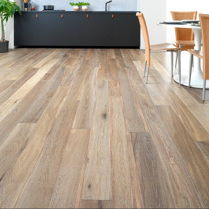 Warm-toned harlech white smoked oak laminate flooring with natural wood grain and subtle color and texture variations