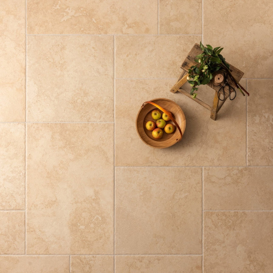 Hartland Abbey 600 x 600mm beige stone-effect floor tile with subtle marbled texture and natural veining