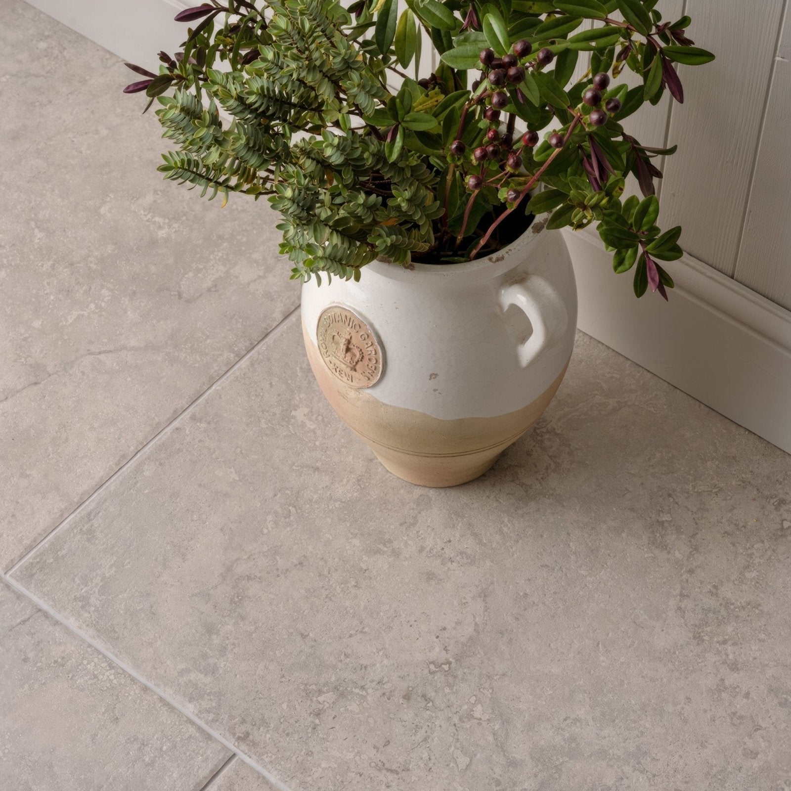 Hartland chapel 900 x 600mm two toned ceramic planter with white upper half beige lower half and embossed emblem