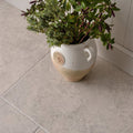 Hartland chapel 900 x 600mm two toned ceramic planter with white upper half beige lower half and embossed emblem