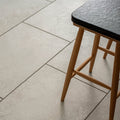 Hartland priory 900 x 600mm dark gray textured countertop with smooth finish on light wood legs