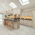 Modern kitchen island hartland priory 900 x 600mm with dark countertop and light wood bar stools