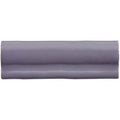 A sleek matte gray ceramic Heath Torus Moulding tile with a subtle two-tone gradient and smooth rounded edges