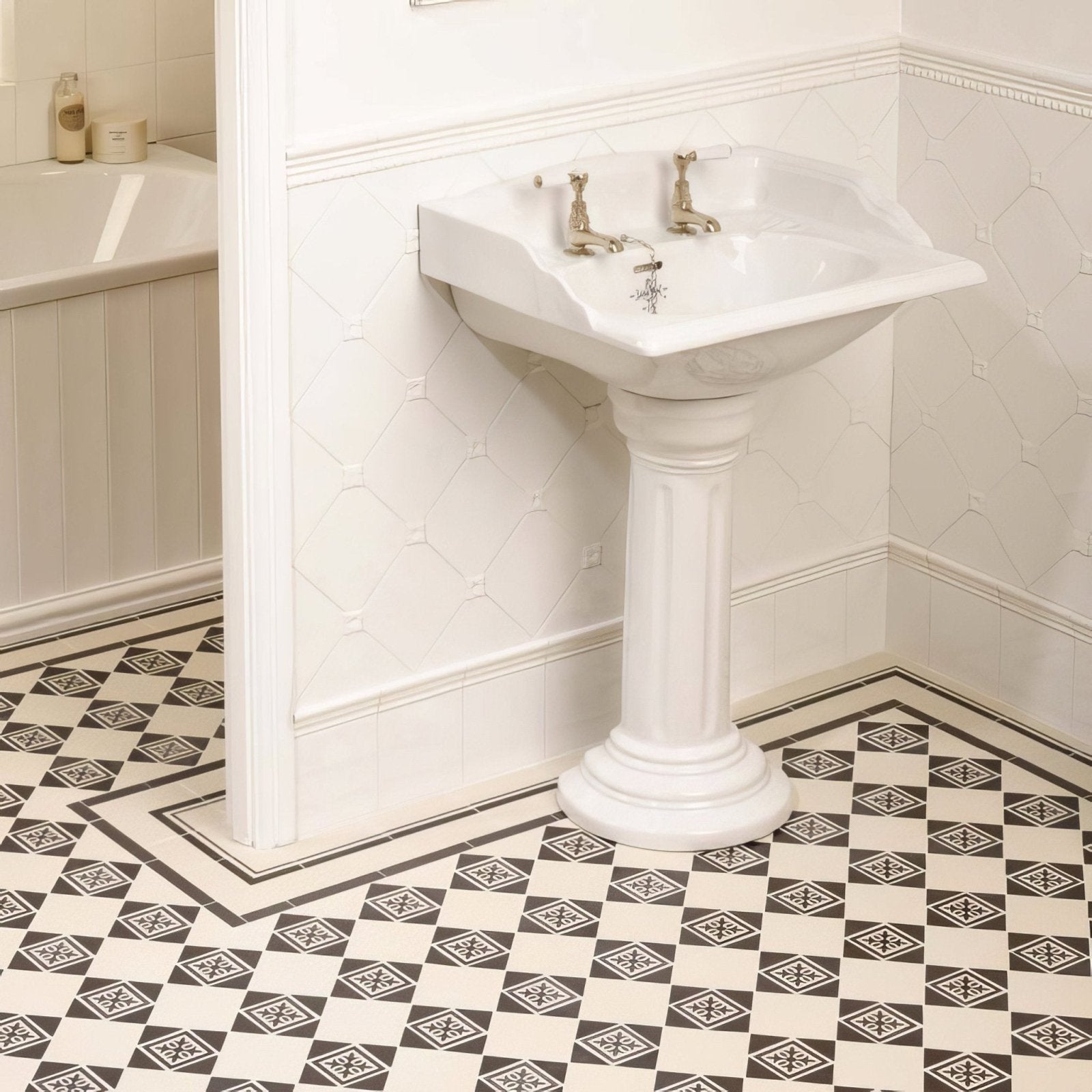 White ceramic pedestal sink helmingham empire with ornate gold toned faucets for elegant bathroom decor