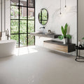 Helsinki 1841 Blanco white porcelain floor tiles with a floating marble vanity