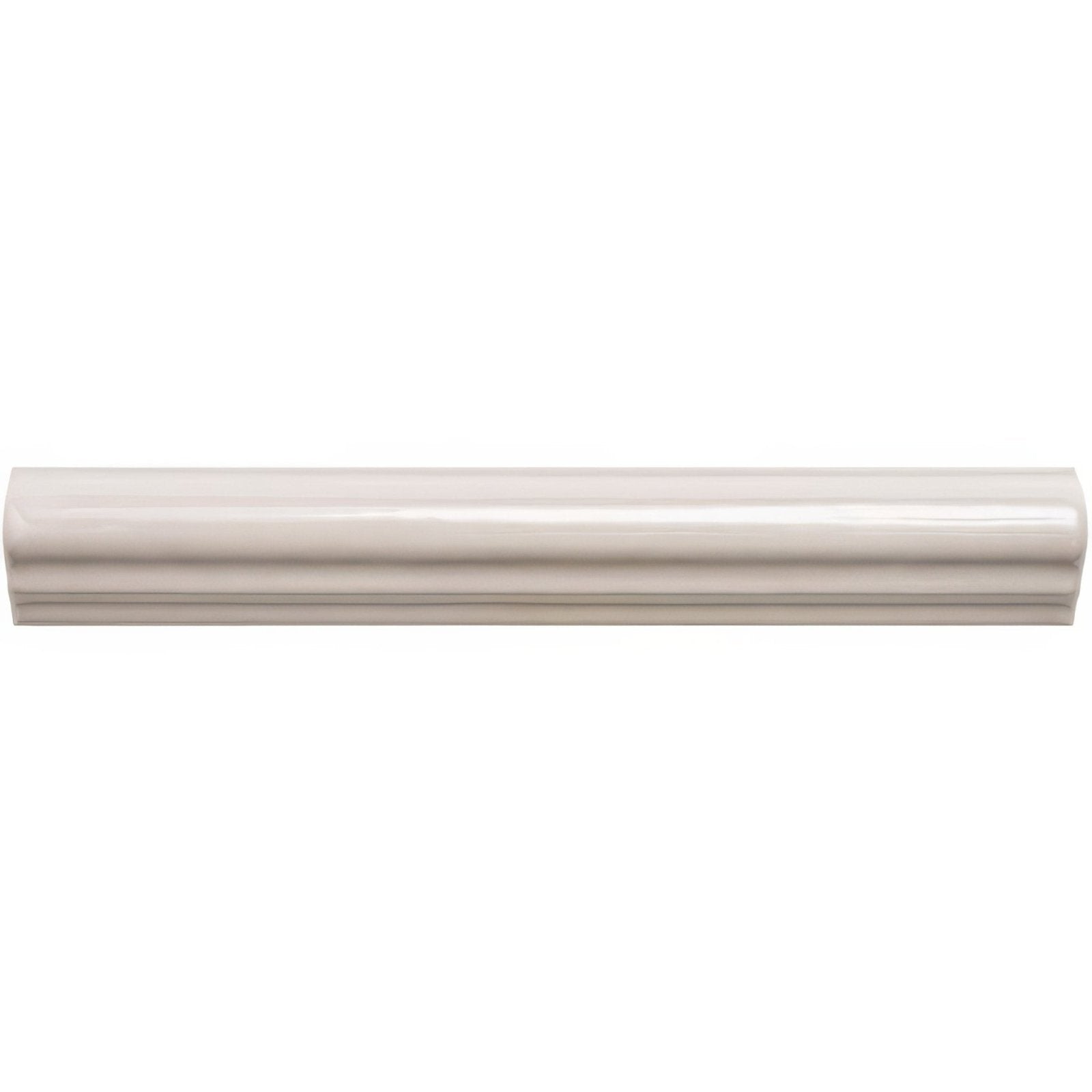 Cream-colored glossy ceramic hibiscus ogee moulding with smooth slightly curved baseboard profile