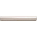 Cream-colored glossy ceramic hibiscus ogee moulding with smooth slightly curved baseboard profile