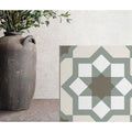 Hidra Capri Warm matt 20 x 20cm ceramic tile with a central brown star and white and muted green diamond patterns