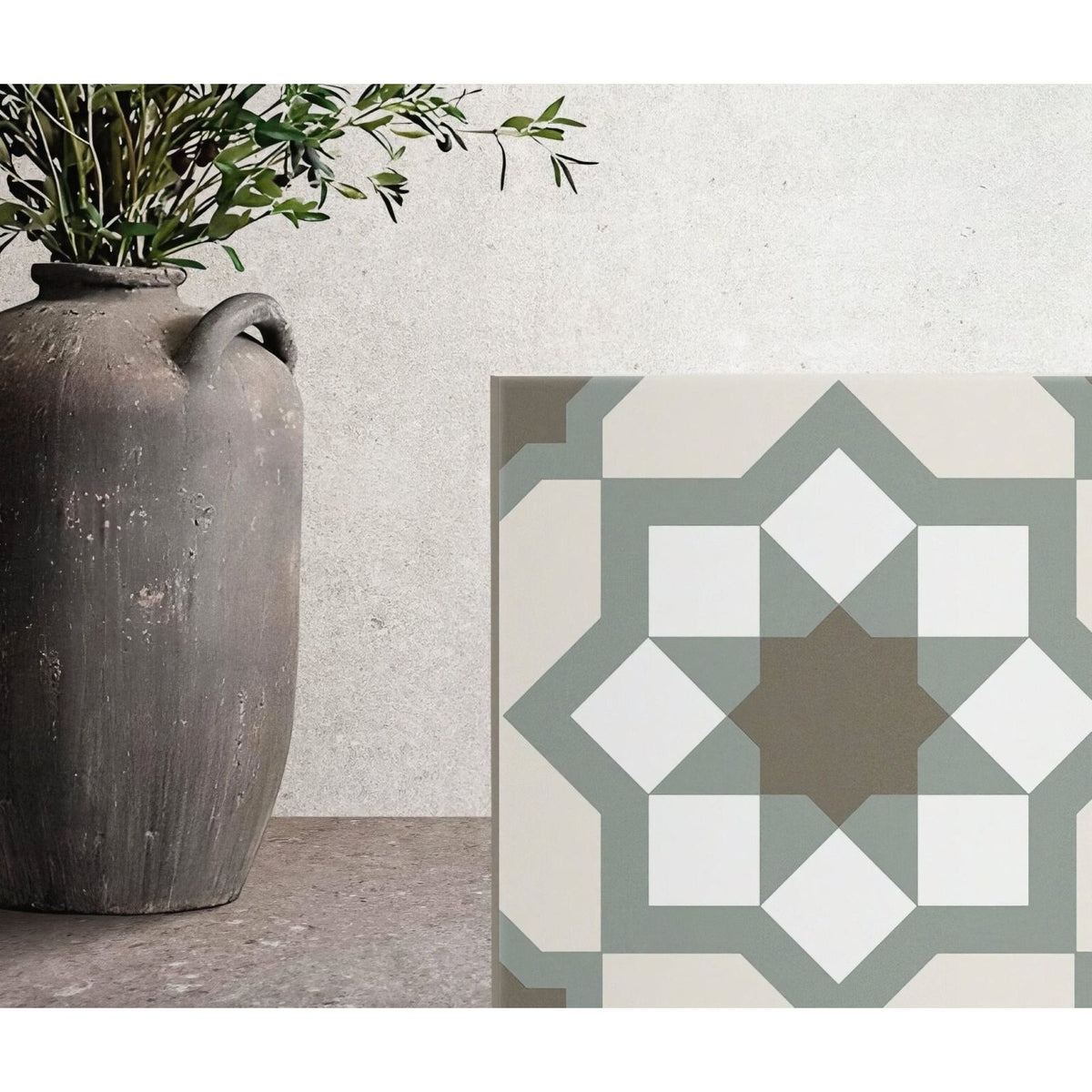 Hidra Capri Warm matt 20 x 20cm ceramic tile with a central brown star and white and muted green diamond patterns